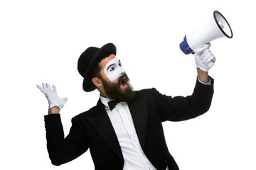 Fototapeta premium Man with a face mime screaming into megaphone