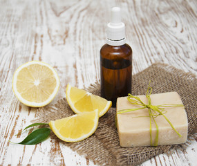 Fototapeta na wymiar handmade lemon soap and essential oil