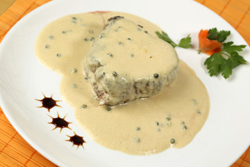 Meat steak with white sauce