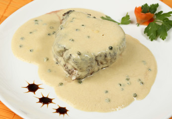 Meat steak with white sauce