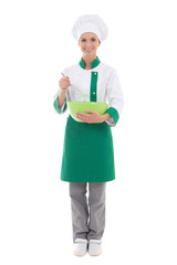 young woman in chef uniform mixing something in green plastic bo