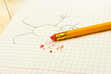 image of pencil with eraser on exercise book background