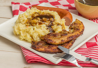 Typical dutch dish zuurkool with pork belly and smoked sausage