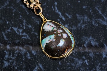 Wood opal pendant © Arena Photo UK