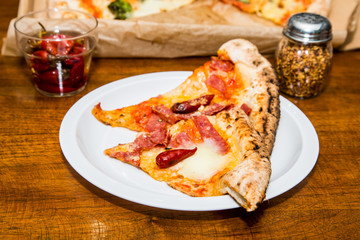Red Peppers on Slices of Pizza