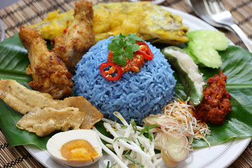 nasi kerabu, blue color rice salad, malaysian cuisine
