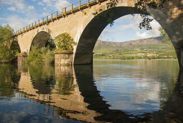Fototapeta na wymiar Train bridge on Sant Antoni Lake, La Pobla de Segur, Pallars