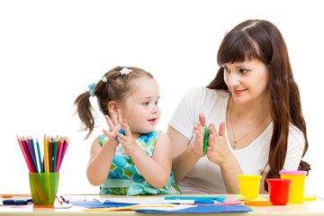 child and mom drawing with colorful pencils