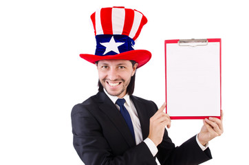 Businessman wearing USA hat with paper on white