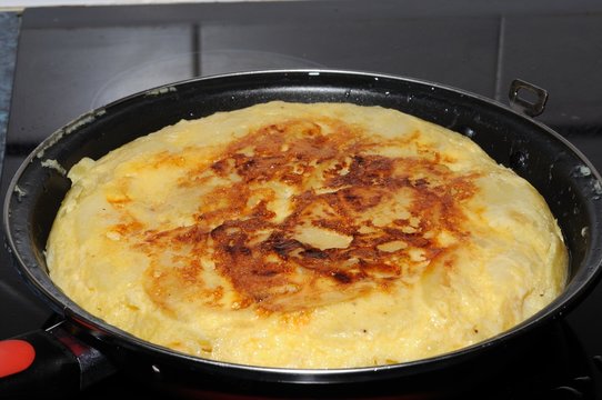 Traditional Spanish tortilla in pan © Arena Photo UK