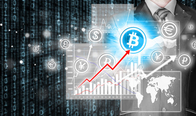 Choosing bitcoins, businessman pressing touch screen button.