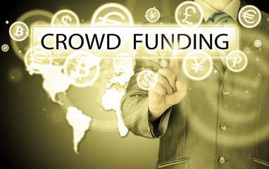Businessman pushes virtual crowd funding button