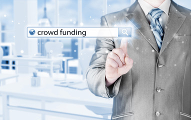 Businessman and crowd funding in search bar