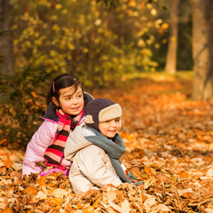 Kids enjoying at park in autumn