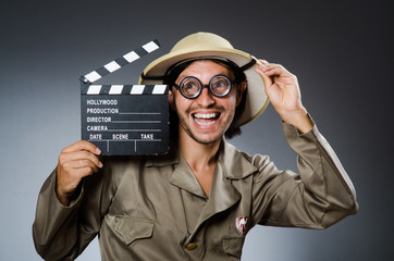 Funny safari hunter against background