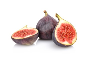 Three sliced figs isolated on white background