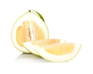 Three pomelos,half,quarter isolated on white