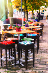 Cafe terrace in autumn city