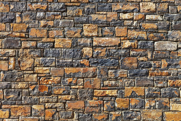 Background the old walls of cut stone