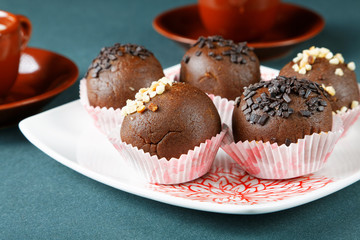 Still-life with a cup of coffee and cakes