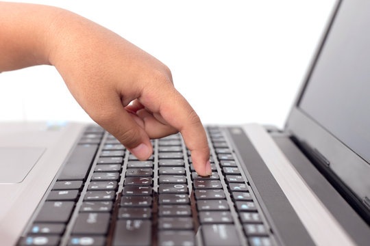 Close up hand using laptop