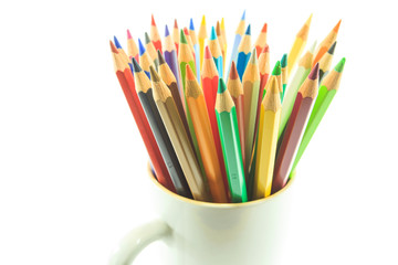 Colour pencils isolated on white background close up