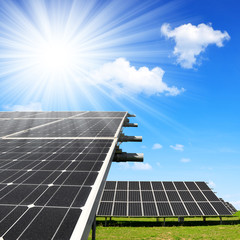 Solar energy panels against sunny sky