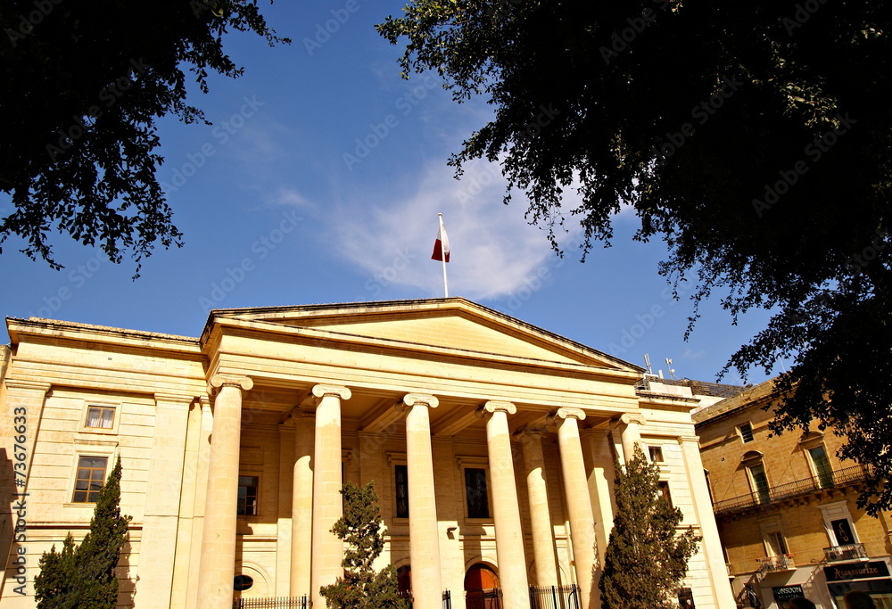 Poster Law Court building facade in Valletta, Malta.