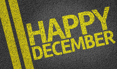 Happy December written on the road