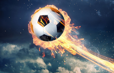 Soccer ball in fire flames