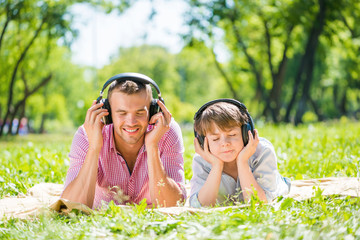 Father and son in park