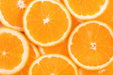 Fotobehang background of orange slices © Viktar Malyshchyts