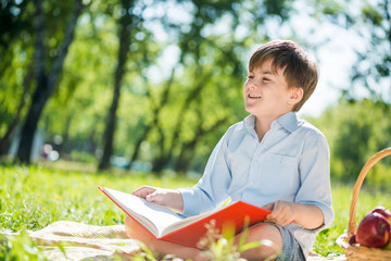 Boy in summer park