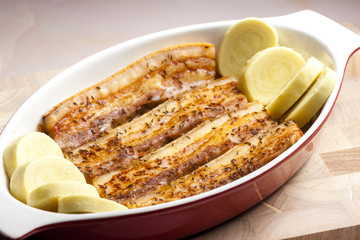baked pork belly on cumin with potato dumlings
