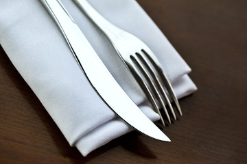 Fork and knife on a napkin