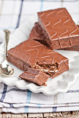 dark chocolate cakes and spoon