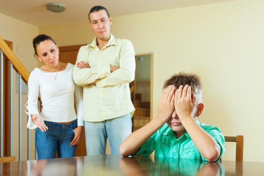 Ordinary family of three  having conflict