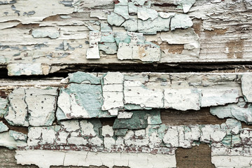 Grunge wall with peeling paint texture