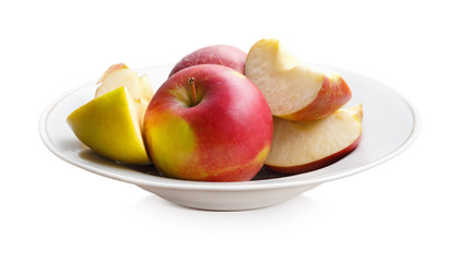 Naklejka na ściany i meble Apples on a white plate