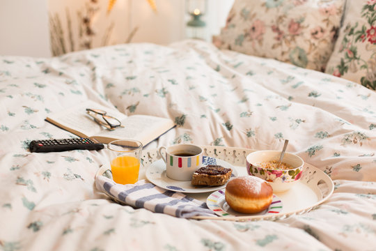 Breakfast served in bed with coffee and juice.