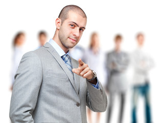 Confident businessman pointing at you