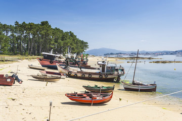 Fototapeta na wymiar Boats on Furado beach