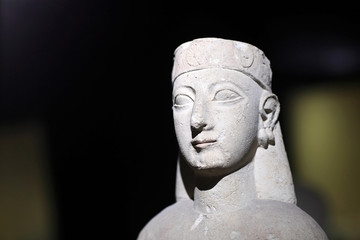 Fototapeta na wymiar Ancient sculpture of woman