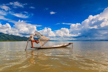 Myanmar fisherman with traditional style at Inle lake
