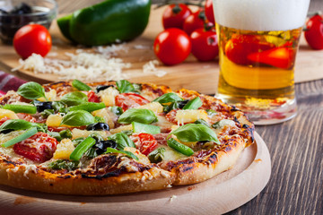 Pizza hawaii with beer