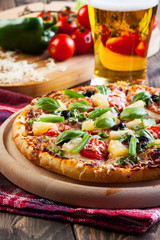 Pizza hawaii with beer