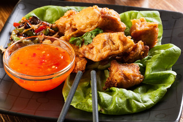 Fried chicken pieces in batter