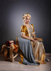 Picture of beautiful haughty queen in royal dress