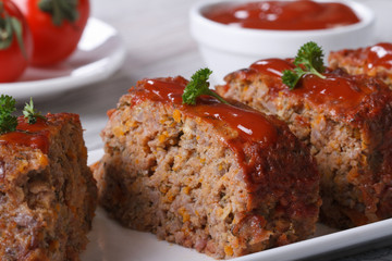 Meat Loaf Closeup sliced on a plate, horizontal