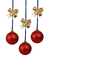 Three red Christmas balls with golden bows